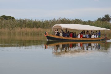 a small boat in a body of water